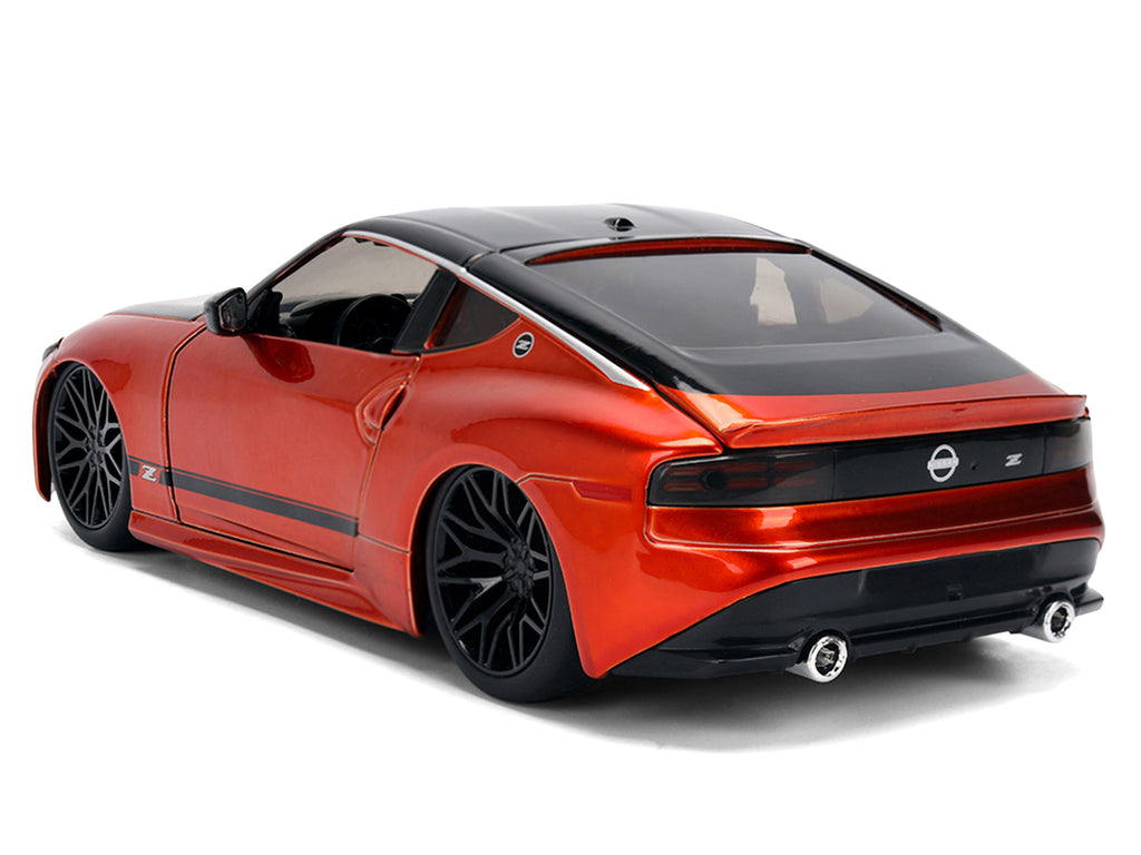 2023 Nissan Z Orange Metallic with Carbon Hood and Black Top 'JDM Tuners' Series 1/24 Diecast Model Car by Jada