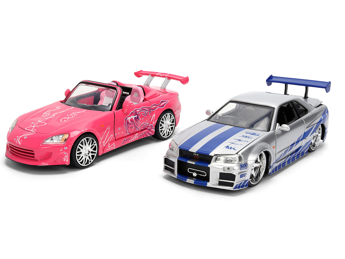 Brian's Nissan Skyline GT-R (R34) Silver Metallic with Blue Stripes and Suki's Honda S2000 Pink with Graphics Set of 2 Cars 'Fast & Furious 25th Anniversary' 'Fast & Furious' Series 1/24 Diecast Model Cars by Jada