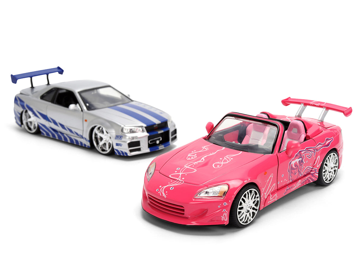 Brian's Nissan Skyline GT-R (R34) Silver Metallic with Blue Stripes and Suki's Honda S2000 Pink with Graphics Set of 2 Cars 'Fast & Furious 25th Anniversary' 'Fast & Furious' Series 1/24 Diecast Model Cars by Jada