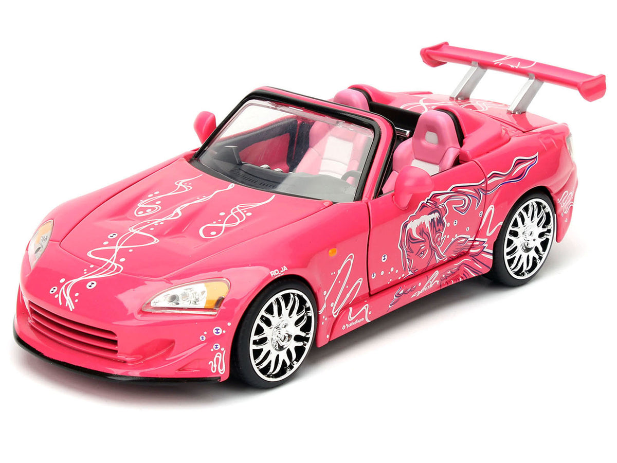 Brian's Nissan Skyline GT-R (R34) Silver Metallic with Blue Stripes and Suki's Honda S2000 Pink with Graphics Set of 2 Cars 'Fast & Furious 25th Anniversary' 'Fast & Furious' Series 1/24 Diecast Model Cars by Jada