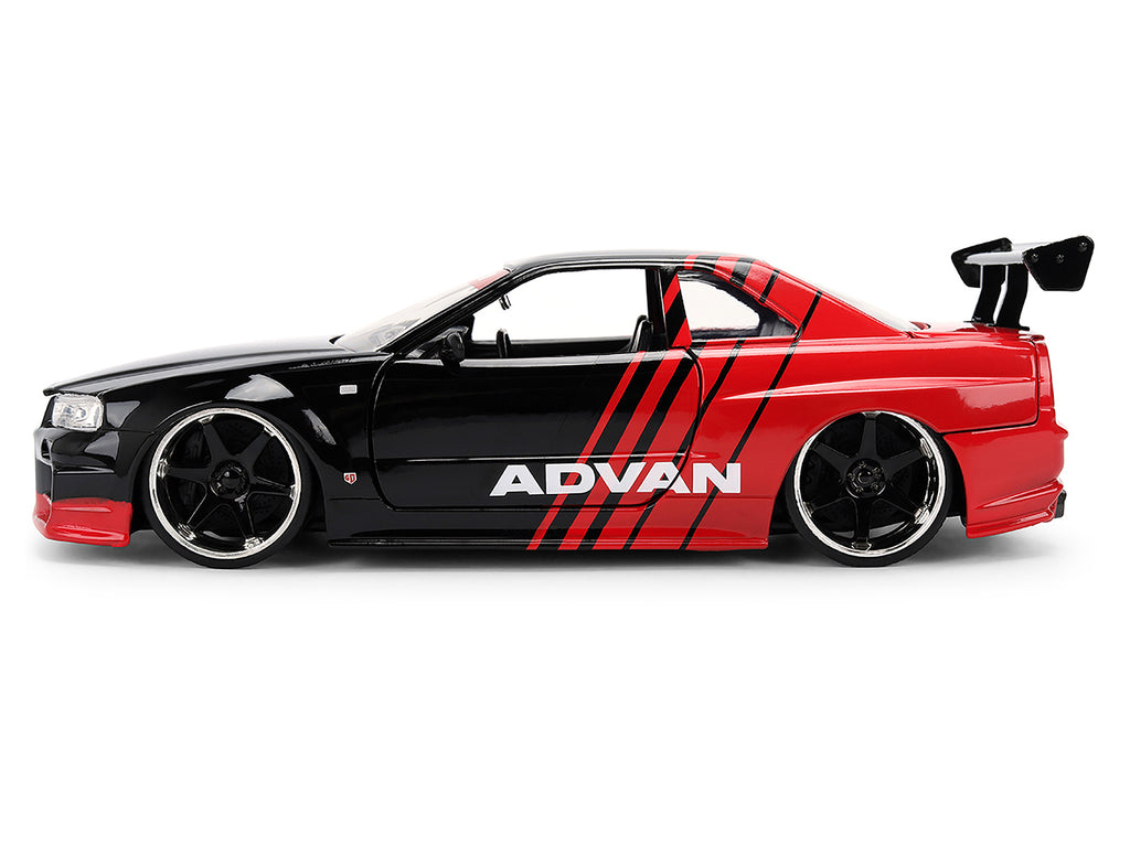 2002 Nissan Skyline GT-R (R34) RHD (Right Hand Drive) 'ADVAN' Black and Red 'AutoWorks' Series 1/24 Diecast Car Model by Jada
