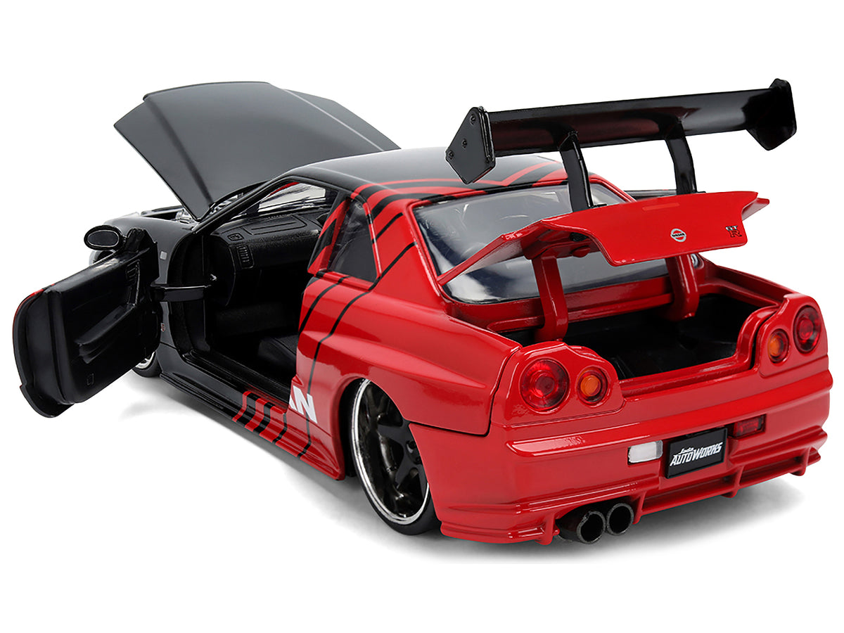 2002 Nissan Skyline GT-R (R34) RHD (Right Hand Drive) 'ADVAN' Black and Red 'AutoWorks' Series 1/24 Diecast Car Model by Jada
