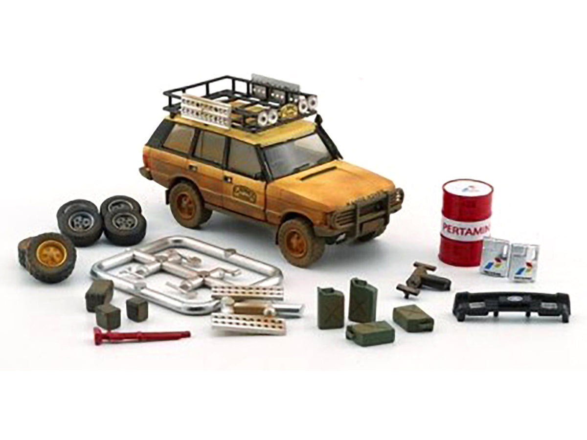 Land Rover Range Rover Classic LSE RHD (Right Hand Drive) 'Camel Trophy' Yellow (Dirty Mud Version) with Roof Rack Extra Wheels and Accessories Limited Edition to 2016 pieces Worldwide 1/64 Diecast Model Car by BM Creations