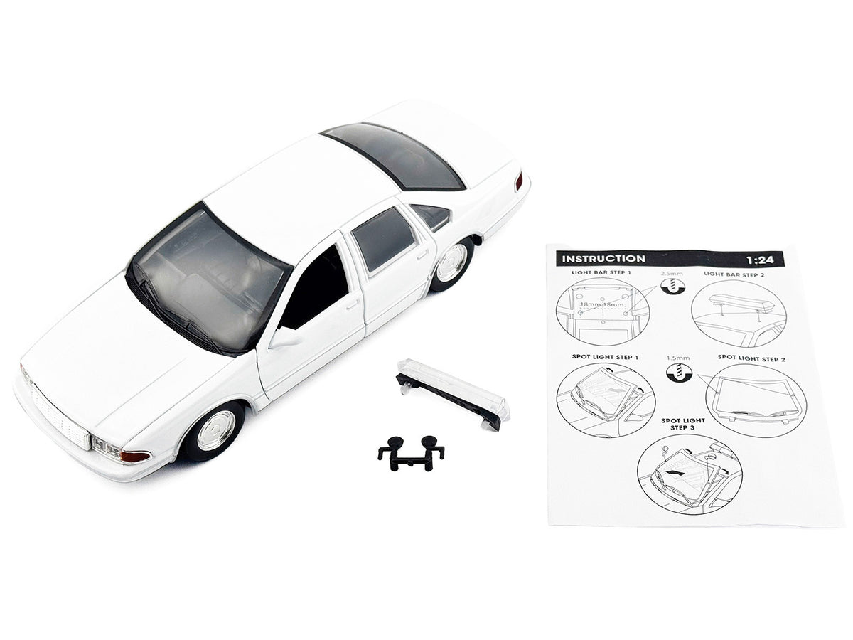 1993 Chevrolet Caprice Police Car Unmarked White 'Custom Builder's Kit' Series 1/24 Diecast Model Car by Motormax