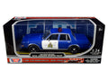 1986 Dodge Diplomat 'Royal Canadian Mounted Police' Metallic Blue and White 1/24 Diecast Model Car by Motormax