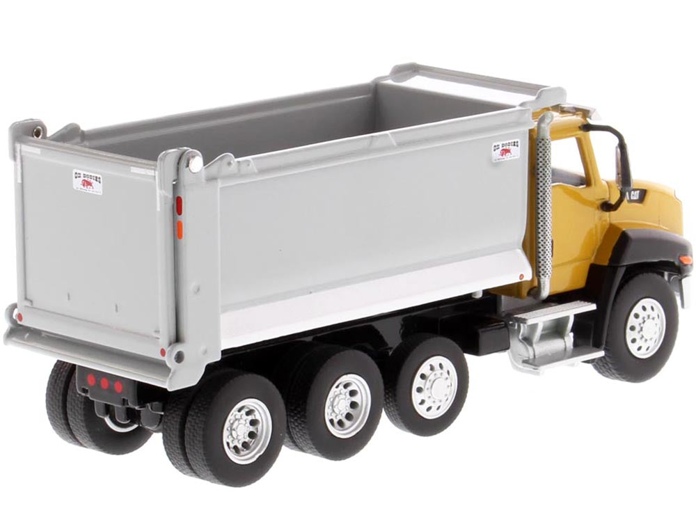 CAT Caterpillar CT660 Day Cab Tractor with OX Stampede Dump Truck 'Play & Collect!' Series 1/64 Diecast Model by Diecast Masters