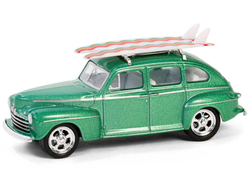 1946 Ford Fordor Super Deluxe Green Metallic with White Interior and Roof Rack with Surfboards 'The Hobby Shop' Series 16 1/64 Diecast Model Car by Greenlight