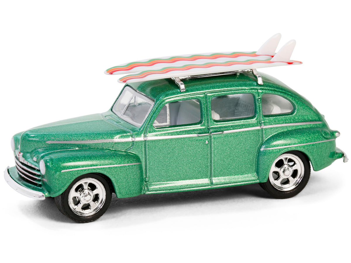 1946 Ford Fordor Super Deluxe Green Metallic with White Interior and Roof Rack with Surfboards 'The Hobby Shop' Series 16 1/64 Diecast Model Car by Greenlight