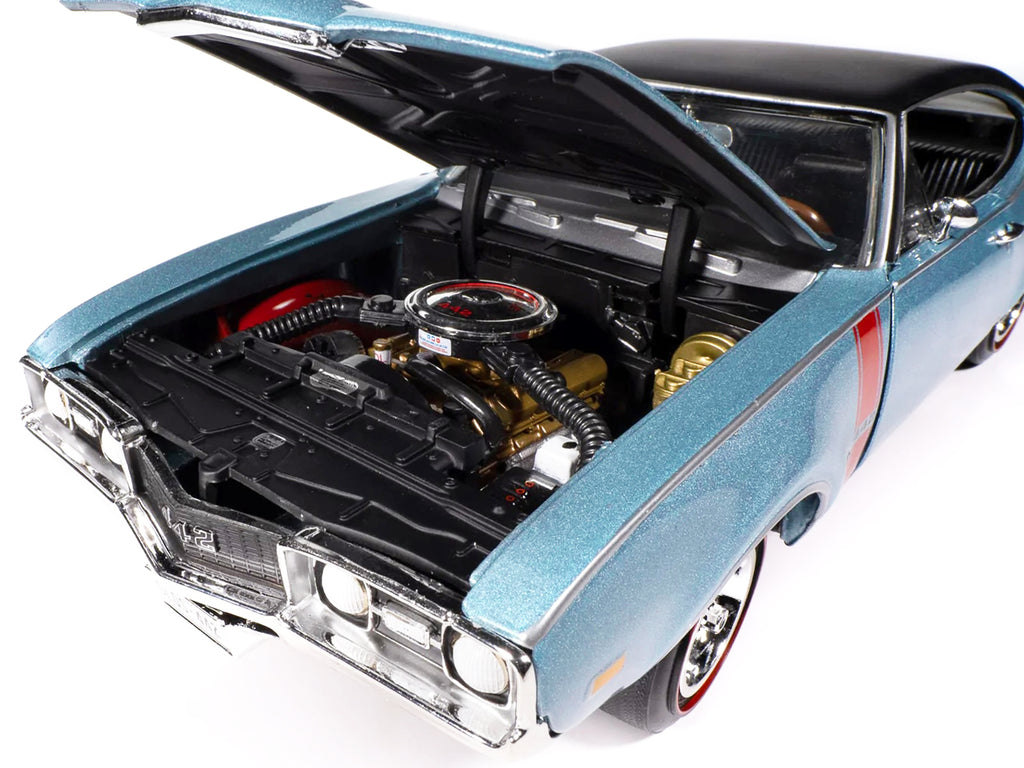 1968 Oldsmobile 442 W30 Holiday Coupe Teal Frost Metallic with Red Stripes and Black Vinyl Top 'Hemmings Motor News July 2023 Cover Car' 'American Muscle' Series 1/18 Diecast Model Car by Auto World