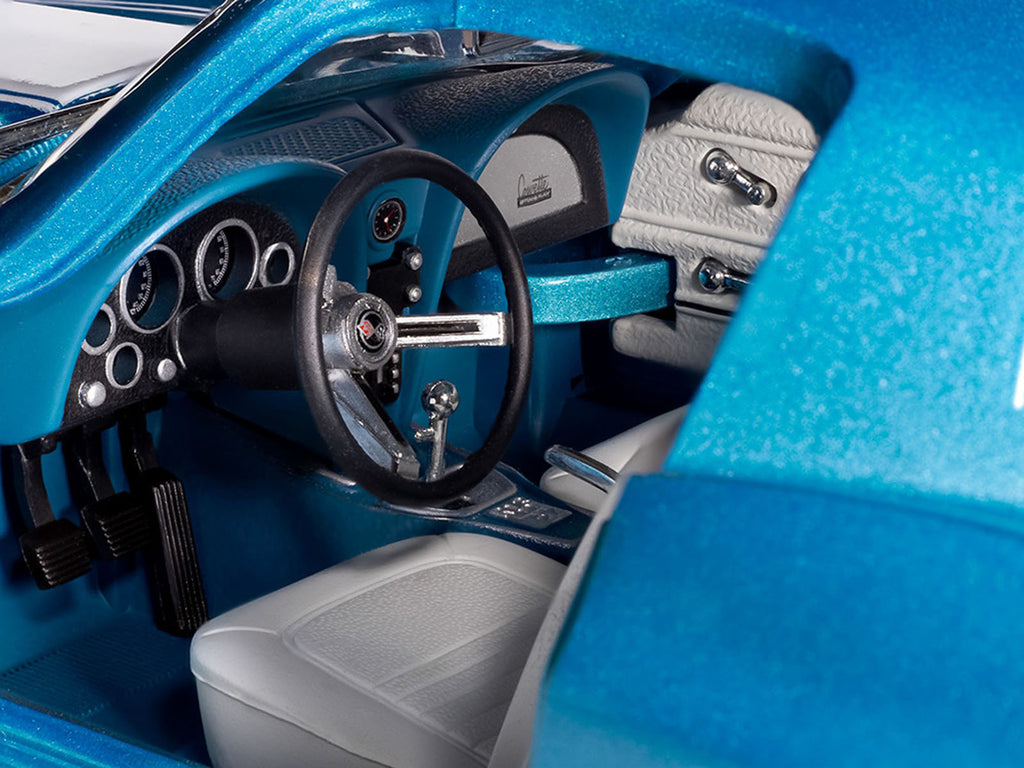 1967 Chevrolet Corvette Stingray Light Blue Metallic with White Hood Stripe 'American Muscle' Series 1/18 Diecast Model Car by Auto World