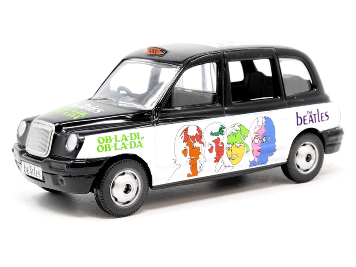 The Beatles London Taxi RHD (Right Hand Drive) 'Ob-La-Di Ob-La-Da' Black and White with Graphics Diecast Model by Corgi