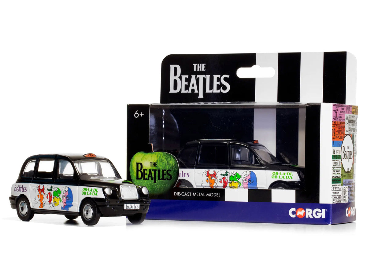 The Beatles London Taxi RHD (Right Hand Drive) 'Ob-La-Di Ob-La-Da' Black and White with Graphics Diecast Model by Corgi