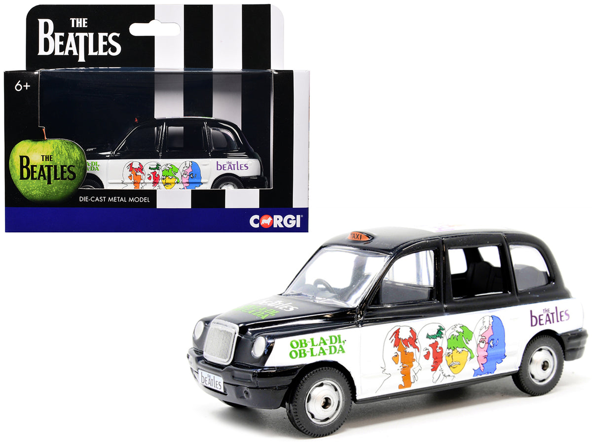 The Beatles London Taxi RHD (Right Hand Drive) 'Ob-La-Di Ob-La-Da' Black and White with Graphics Diecast Model by Corgi
