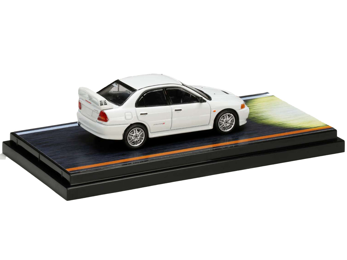 Mitsubishi Lancer RS Evolution IV RHD (Right Hand Drive) White 'Monstar' with Seiji Iwaki Driver Figure 'Initial D' (1995-2013) Manga 1/64 Diecast Model Car by Hobby Japan