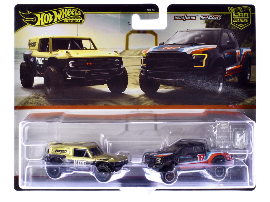 Ford Bronco R Gold Metallic and Black and 2017 Ford F-150 Raptor Pickup Truck #17 Black with Stripes 'Car Culture' Set of 2 Cars Diecast Model Cars by Hot Wheels