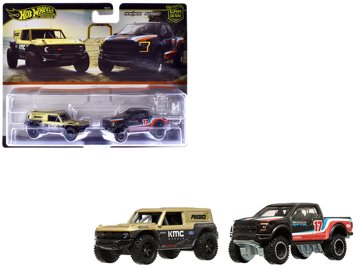 Ford Bronco R Gold Metallic and Black and 2017 Ford F-150 Raptor Pickup Truck #17 Black with Stripes 'Car Culture' Set of 2 Cars Diecast Model Cars by Hot Wheels