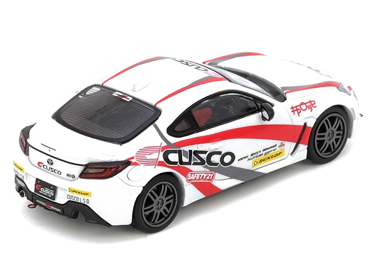 Toyota GR86 Tuned by 'CUSCO' RHD (Right Hand Drive) White with Red and Gray Stripes 1/64 Diecast Model Car by Inno Models