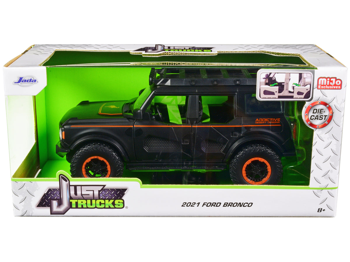 2021 Ford Bronco Matt Black with Orange Stripes and Roof Rack 'Addictive Desert Designs' 'Just Trucks' Series 1/24 Diecast Model Car by Jada