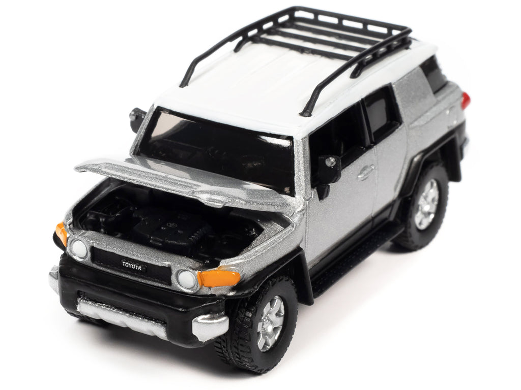 2007 Toyota FJ Cruiser Titanium Silver Metallic with White Top and Roofrack 'Classic Gold Collection' Series Limited Edition 1/64 Diecast Model Car by Johnny Lightning