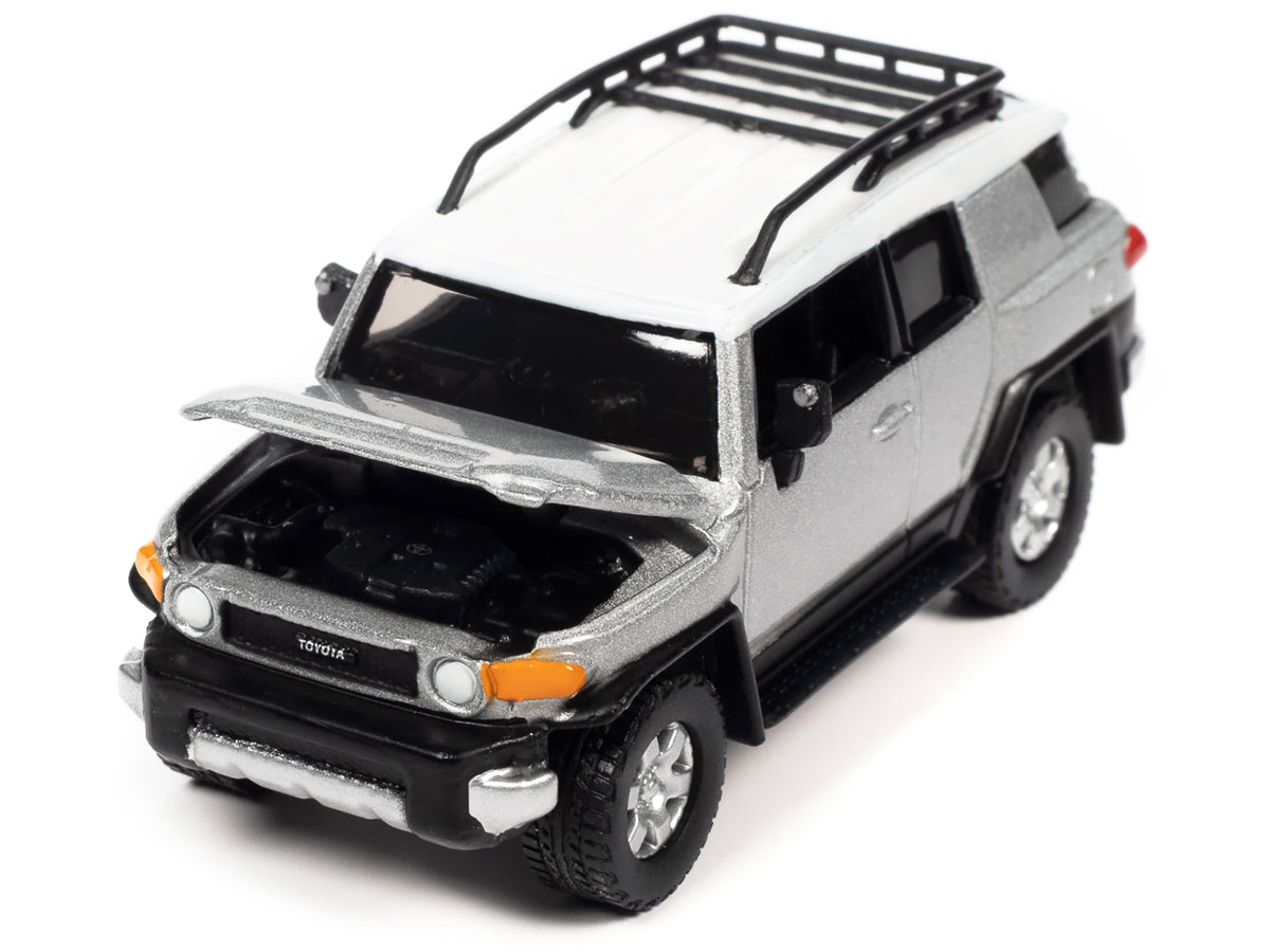 2007 Toyota FJ Cruiser Titanium Silver Metallic with White Top and Roofrack 'Classic Gold Collection' Series Limited Edition 1/64 Diecast Model Car by Johnny Lightning