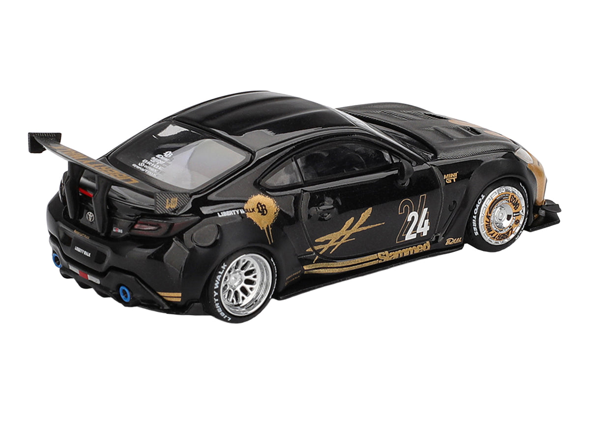Toyota GR86 'LB-Nation - Liberty Walk' #24 Black with Carbon Hood and Gold Graphics Limited Edition 1/64 Diecast Model Car by Mini GT