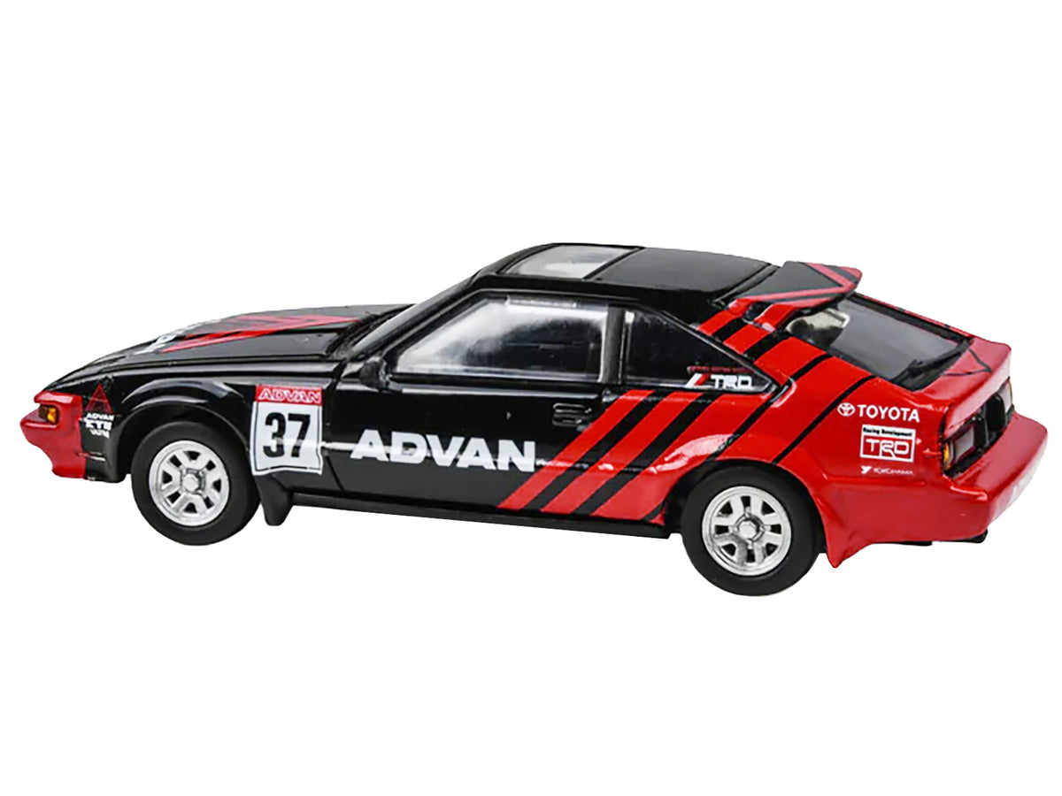 1984 Toyota Celica Supra #37 'ADVAN' Black and Red 1/64 Diecast Model Car by Paragon Models
