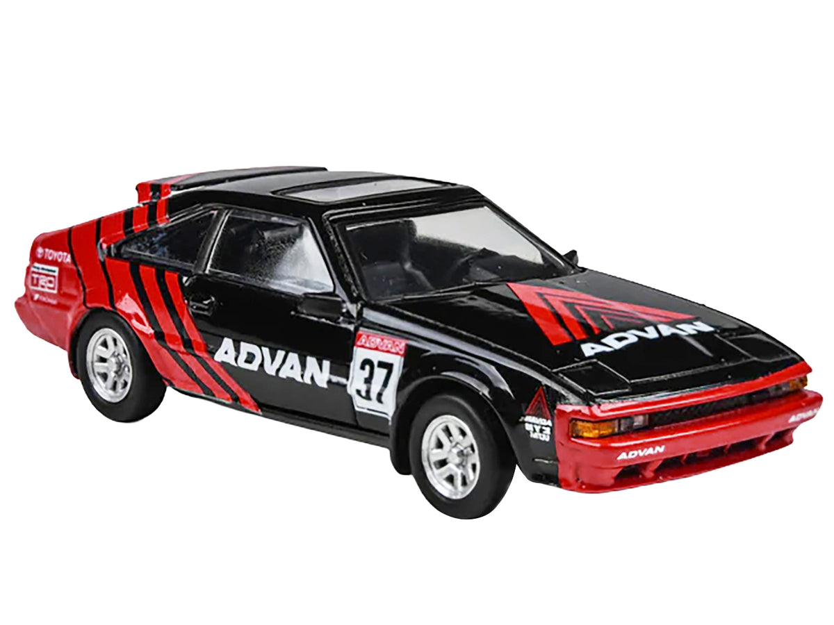 1984 Toyota Celica Supra #37 'ADVAN' Black and Red 1/64 Diecast Model Car by Paragon Models
