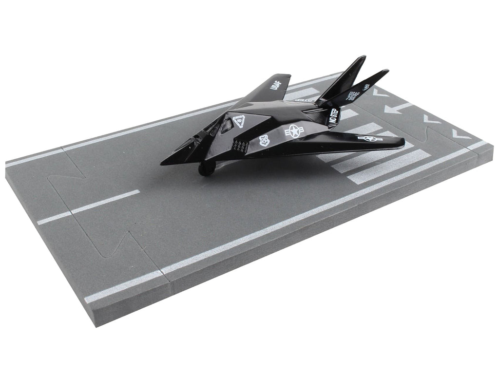 Lockheed F-117 Nighthawk Stealth Aircraft Black 'United States Air Force' with Runway Section Diecast Model Airplane by Runway24