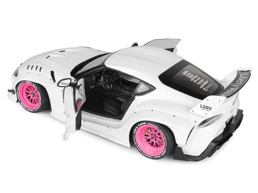 2025 Toyota GR Supra 'Liberty Walk' Body Kit White Metallic with Pink Wheels 1/18 Diecast Model Car by Solido