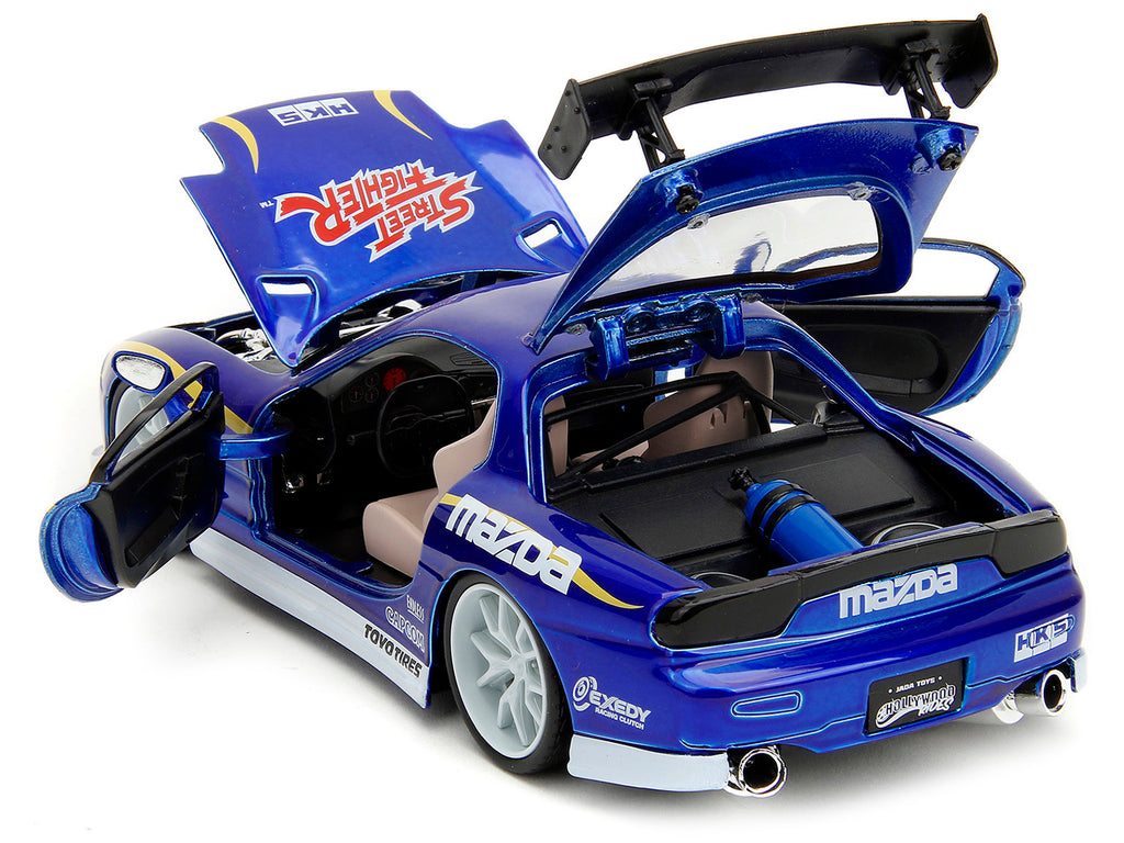 1993 Mazda RX-7 Candy Blue Metallic with Graphics and Chun-Li Diecast Figure 'Street Fighter' Video Game 'Anime Hollywood Rides' Series 1/24 Diecast Model Car by Jada