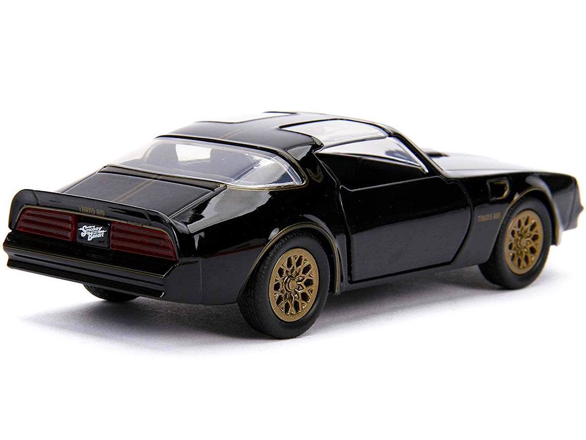 1977 Pontiac Firebird Black 'Smokey and the Bandit' (1977) Movie 'Hollywood Rides' Series 1/32 Diecast Model Car by Jada