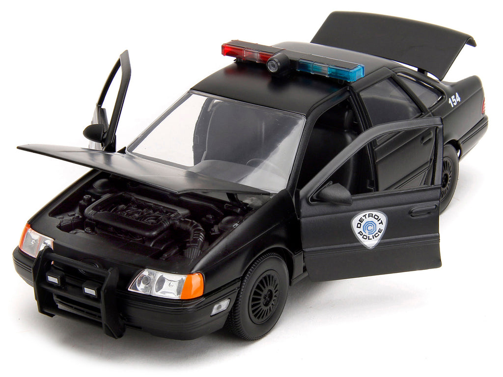 Ford Taurus OCP Matt Black 'Detroit Police' and Robocop Diecast Figure 35th Anniversary 'Robocop' (1987) Movie 'Hollywood Rides' Series 1/24 Diecast Model Car by Jada