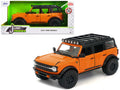 2021 Ford Bronco Orange with Black Stripes and Roof Rack 'Just Trucks' Series 1/24 Diecast Model Car by Jada