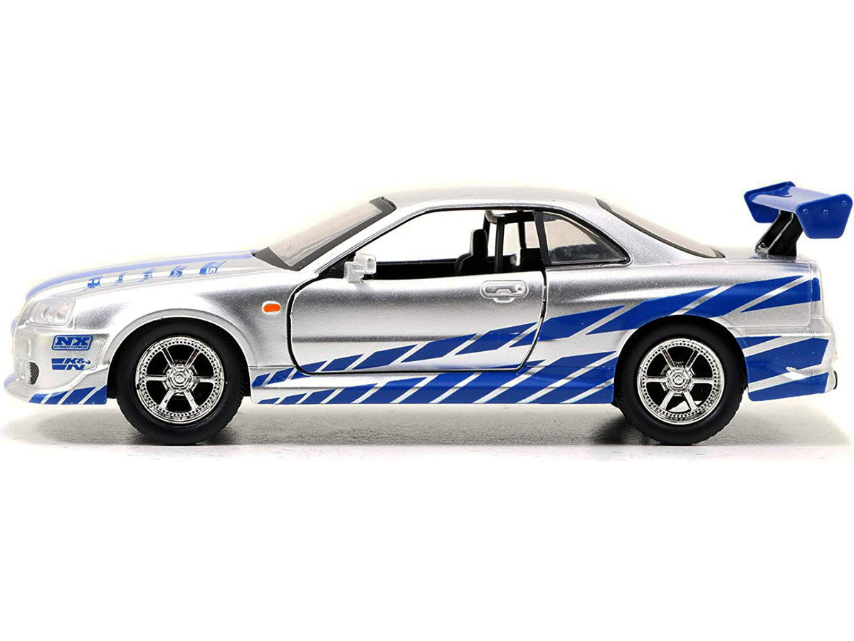 Brian's Nissan Skyline GT-R (R34) RHD (Right Hand Drive) Silver Metallic with Blue Stripes '2 Fast 2 Furious' (2003) Movie 'Fast & Furious 25th Anniversary' Series 1/32 Diecast Car Model by Jada