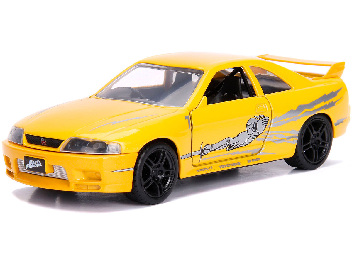 Leon's Nissan Skyline GT-R (BCNR33) Yellow Metallic with Graphics 'Fast & Furious' Series 1/32 Diecast Model Car by Jada