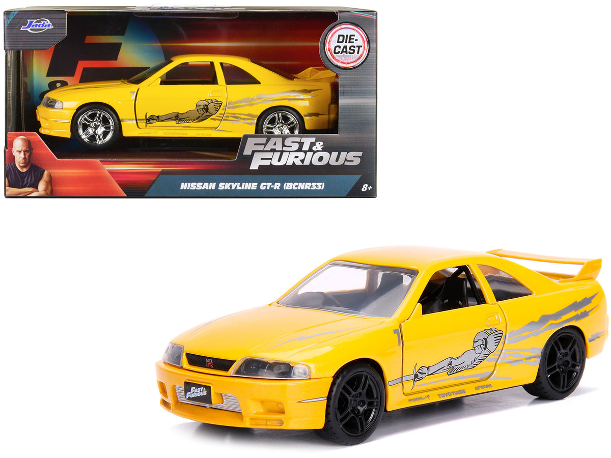 Leon's Nissan Skyline GT-R (BCNR33) Yellow Metallic with Graphics 'Fast & Furious' Series 1/32 Diecast Model Car by Jada