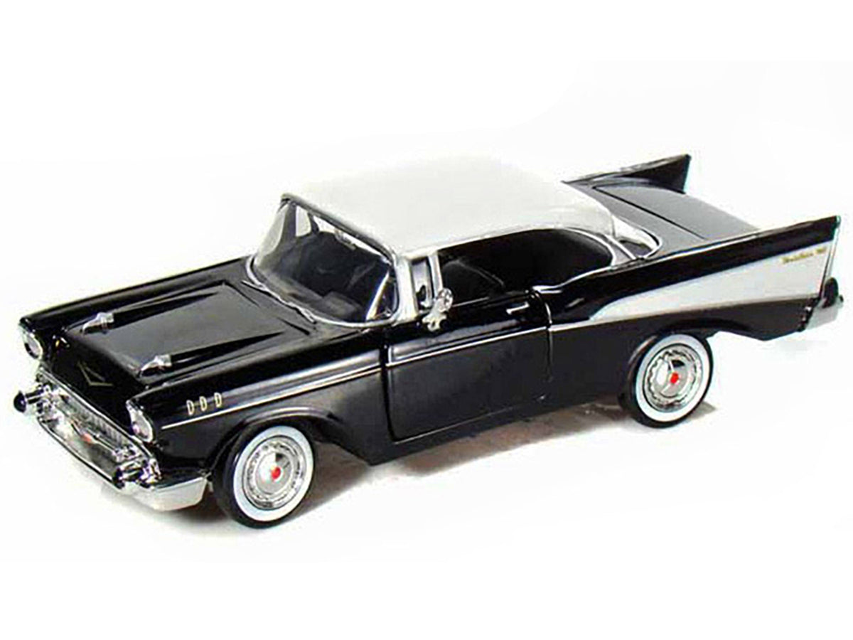 1957 Chevrolet Bel Air Black with White Top 1/24 Diecast Model Car by Motormax