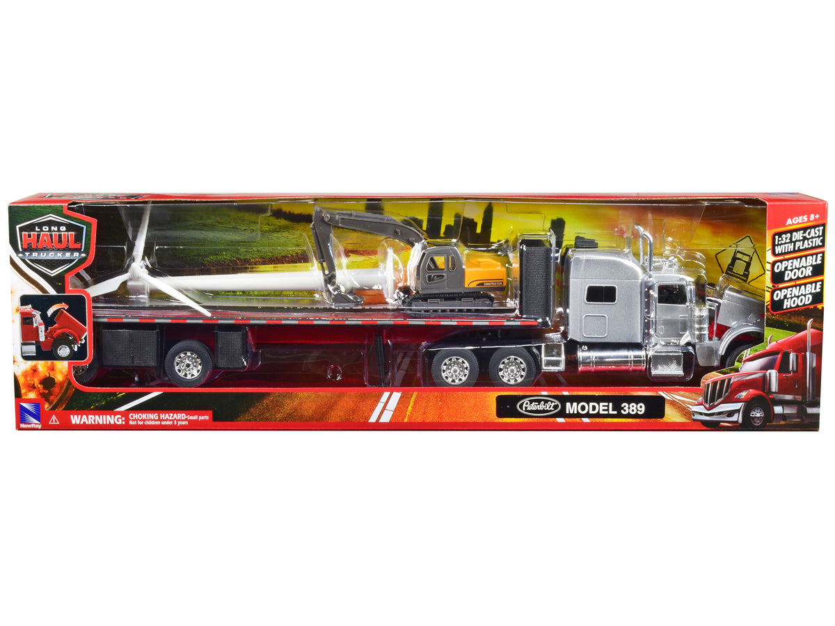 Peterbilt 389 Truck with Flatbed Trailer Silver Metallic with Excavator and Wind Turbine 'Long Haul Truckers' Series 1/32 Diecast Model by New Ray